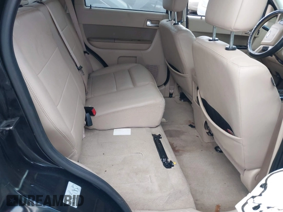 2010 Ford Escape Limited z VIN 1FMCU0EG0AKC63470, wystawiony jako IAAI lot #41198945 z przebiegiem 198 301 mil mil oraz . Historia ofert i sprzedaży dostępna na DreamBid. Obrazek 8.