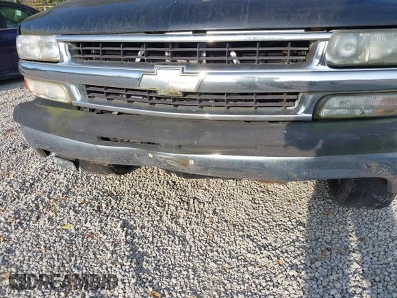 2003 Chevrolet Suburban LT z VIN 1GNEC16Z13J216552, wystawiony jako IAAI lot #40193670 z przebiegiem 235 840 mil mil oraz . Historia ofert i sprzedaży dostępna na DreamBid. Obrazek 6.