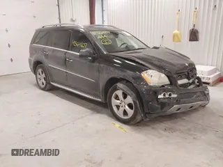 2011 Mercedes-Benz GL-Class GL 450 with VIN 4JGBF7BE2BA737203, listed as a IAAI auction lot 41364607 with 133,921 mi miles. Bid and sale history available at carsss.com. Image 1.