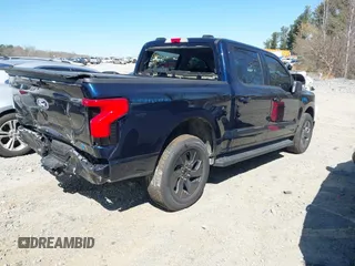 2024 Ford F-150 Lightning Flash with VIN 1FT6W3L75RWG30755, listed as a IAAI auction lot 41817158 with 1,932 mi miles and . Bid and sale history available at DreamBid. Image 4.