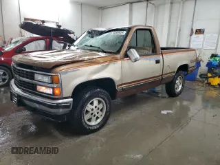 1990 Chevrolet Silverado 1500 with VIN 1GCDK14K4LZ124446, listed as a Copart auction lot 82608634 with 140,102 mi miles and Salvage Title. Bid and sale history available at DreamBid. Image 1.