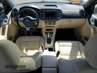 2015 Volkswagen Tiguan SE with VIN WVGAV7AX2FW094359, listed as a Copart auction lot 60101885 with 106,305 mi miles and Salvage title. Bid and sale history available at DreamBid. Image 8.