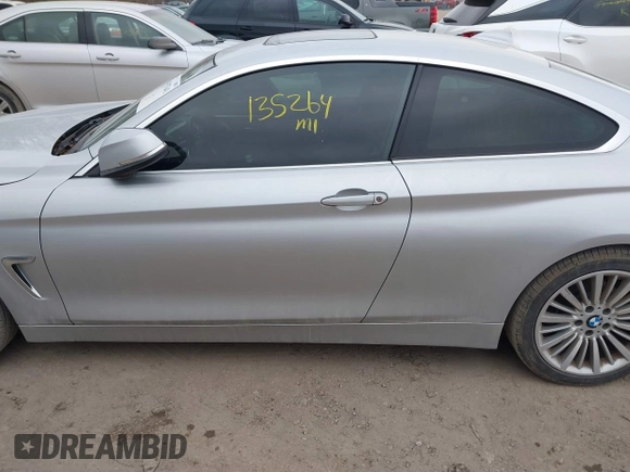 2014 BMW 4 Series 428i xDrive with VIN WBA3N5C53EF716542, listed as a IAAI auction lot 41157641 with 135,264 mi miles and . Bid and sale history available at DreamBid. Image 14.