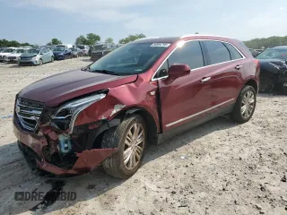 2017 Cadillac XT5 Premium Luxury AWD with VIN 1GYKNERS1HZ112898, listed as a Copart auction lot 58984795 with 140,803 mi miles and Salvage title. Bid and sale history available at DreamBid. Image 1.