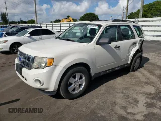 2011 Ford Escape XLS with VIN 1FMCU9C71BKC08406, listed as a Copart auction lot 61359975 with 182,954 mi miles and Salvage title. Bid and sale history available at DreamBid. Image 1.