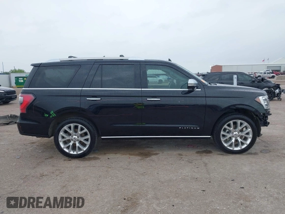 2019 Ford Expedition Platinum with VIN 1FMJU1LT1KEA23423, listed as a IAAI auction lot 42134271 with 59,180 mi miles and . Bid and sale history available at DreamBid. Image 14.