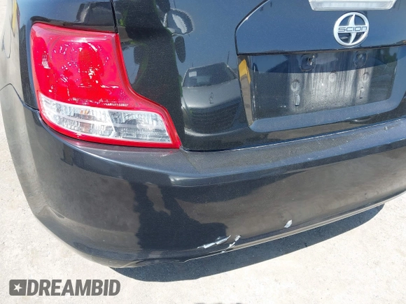 2012 Scion tC with VIN JTKJF5C79C3025581, listed as a IAAI auction lot 42170728 with 92,842 mi miles. Bid and sale history available at carsss.com. Image 12.