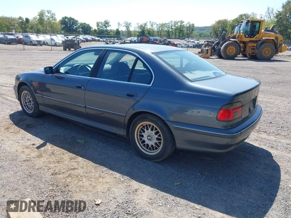 2000 BMW 5 Series 528iA with VIN WBADM6344YGU26491, listed as a IAAI auction lot 40301317 with 157,798 mi miles. Bid and sale history available at carsss.com. Image 3.
