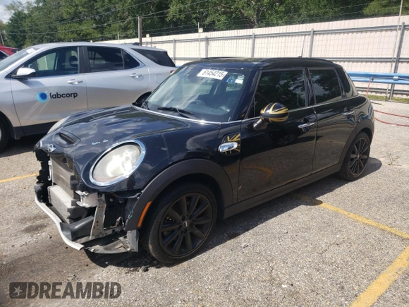 2016 MINI Hardtop 4 Door S with VIN WMWXU3C58G2B67264, listed as a Copart auction lot 61454215 with 66,550 mi miles and Salvage title. Bid and sale history available at DreamBid. Image 1.