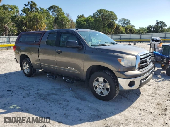 2010 Toyota Tundra 4WD Truck with VIN 5TFUM5F13AX014616, listed as a Copart auction lot 50953075 with 204,002 mi miles and Clean Title. Bid and sale history available at carsss.com. Image 4.