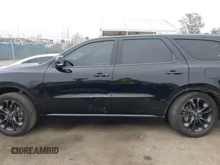 2021 Dodge Durango R/T with VIN 1C4SDHCT5MC660105, listed as a IAAI auction lot 42373172 with 75,227 mi miles and . Bid and sale history available at DreamBid. Image 14.