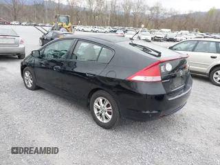 2010 Honda Insight EX with VIN JHMZE2H73AS002299, listed as a IAAI auction lot 41900761 with 251,934 mi miles and . Bid and sale history available at DreamBid. Image 3.