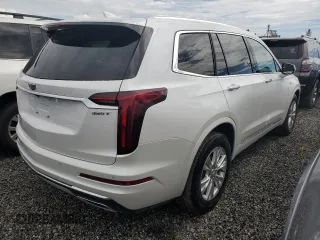 2023 Cadillac XT6 FWD Luxury with VIN 1GYKPAR46PZ110244, listed as a Copart auction lot 73755704 with 18,915 mi miles and Non Repairable. Bid and sale history available at carsss.com. Image 3.