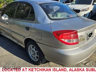 2004 Kia Rio with VIN KNADC125546325654, listed as a Copart auction lot 65521594 with 157,436 mi miles and Salvage Title. Bid and sale history available at carsss.com. Image 2.