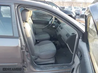 2006 Ford Focus SE with VIN 1FAHP36N16W228667, listed as a IAAI auction lot 41965634 with 141,460 mi miles. Bid and sale history available at carsss.com. Image 5.