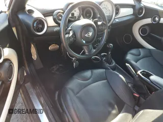 2014 MINI Convertible S z VIN WMWZP3C58ET707569, wystawiony jako Copart lot #42129485 z przebiegiem 62 343 mil mil oraz Szkoda całkowita • Salvage title. Historia ofert i sprzedaży dostępna na DreamBid. Obrazek 8.
