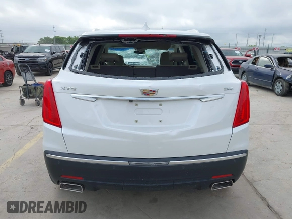 2017 Cadillac XT5 Luxury FWD z VIN 1GYKNBRS3HZ195197, wystawiony jako IAAI lot #42033419 z przebiegiem 76 709 mil mil oraz . Historia ofert i sprzedaży dostępna na DreamBid. Obrazek 16.
