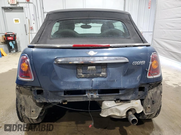 2009 MINI Convertible z VIN WMWMR335X9TJ93685, wystawiony jako Copart lot #50899755 z przebiegiem 123 609 mil mil oraz Szkoda całkowita • Salvage title. Historia ofert i sprzedaży dostępna na DreamBid. Obrazek 6.