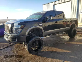 2017 Nissan Titan XD PRO-4X with VIN 1N6BA1F42HN528060, listed as a Copart auction lot 42199235 with 75,723 mi miles and Clean Title. Bid and sale history available at carsss.com. Image 1.