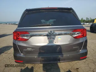 2018 Honda Odyssey Touring с VIN 5FNRL6H83JB009998, выставлен на аукционе Copart как лот 60616695 с пробегом 101 880 миль миль и Списание • Salvage title. История ставок и продаж доступна на DreamBid. Изображение 6.