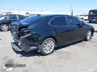 2020 Toyota Camry LE with VIN 4T1C11AKXLU955851, listed as a IAAI auction lot 41996827 with 59,008 mi miles and . Bid and sale history available at carsss.com. Image 4.