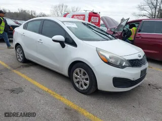 2015 Kia Rio LX with VIN KNADM4A37F6528238, listed as a IAAI auction lot 41851351 with 123,898 mi miles. Bid and sale history available at carsss.com. Image 1.