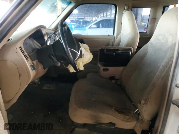 1999 Ford Ranger XL with VIN 1FTYR14V3XPB05881, listed as a Copart auction lot 44212825 with 336,424 mi miles and Salvage title. Bid and sale history available at DreamBid. Image 7.