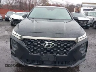 2019 Hyundai Santa Fe SE with VIN 5NMS23AD8KH008680, listed as a IAAI auction lot 42023218 with 67,745 mi miles and . Bid and sale history available at DreamBid. Image 12.