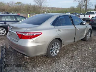 2017 Toyota Camry Hybrid LE with VIN 4T1BD1FK9HU214495, listed as a IAAI auction lot 41953655 with 106,409 mi miles. Bid and sale history available at carsss.com. Image 4.
