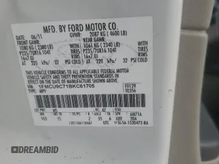 2011 Ford Escape XLS z VIN 1FMCU9C71BKC61705, wystawiony jako Copart lot #53281065 z przebiegiem 206 804 mil mil oraz Szkoda całkowita • Salvage title. Historia ofert i sprzedaży dostępna na DreamBid. Obrazek 13.