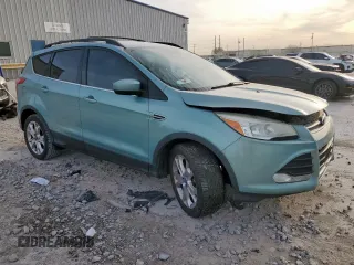 2013 Ford Escape SE with VIN 1FMCU0G97DUC34491, listed as a Copart auction lot 50516525 with 133,764 mi miles and Salvage title. Bid and sale history available at DreamBid. Image 4.