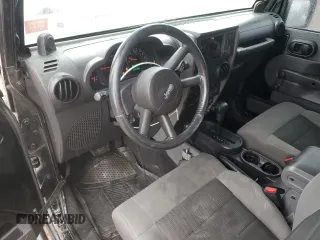 2008 Jeep Wrangler X z VIN 1J8FA24168L646281, wystawiony jako Copart lot #57689895 z przebiegiem 205 348 mil mil oraz Szkoda całkowita • Salvage title. Historia ofert i sprzedaży dostępna na DreamBid. Obrazek 8.