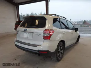 2016 Subaru Forester 2.0XT Premium with VIN JF2SJGDC9GH550555, listed as a IAAI auction lot 41781267 with 138,230 mi miles. Bid and sale history available at carsss.com. Image 4.