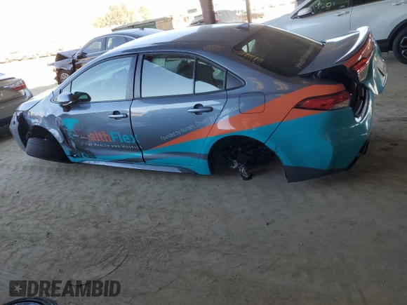 2023 Toyota Corolla Hybrid LE with VIN JTDBCMFE9P3013378, listed as a Copart auction lot 46881875 with 22,183 mi miles and Salvage Title. Bid and sale history available at carsss.com. Image 2.