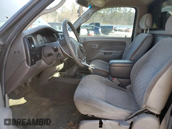 2002 Toyota Tacoma z VIN 5TEPM62N12Z011042, wystawiony jako Copart lot #47381135 z przebiegiem 217 358 mil mil oraz Szkoda całkowita • Salvage title. Historia ofert i sprzedaży dostępna na DreamBid. Obrazek 7.