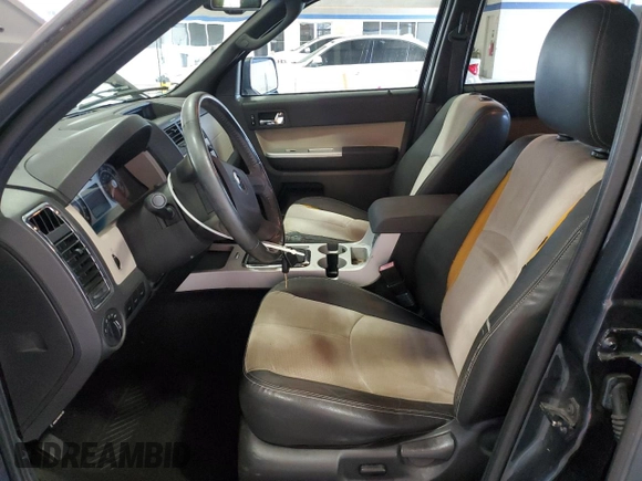 2009 Mercury Mariner Premier z VIN 4M2CU877X9KJ14960, wystawiony jako Copart lot #62951805 z przebiegiem 131 255 mil mil oraz Szkoda całkowita • Salvage title. Historia ofert i sprzedaży dostępna na DreamBid. Obrazek 7.