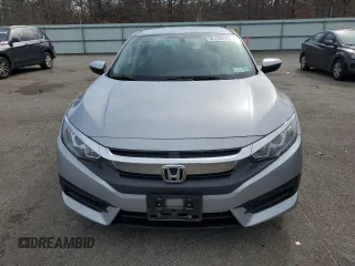 2017 Honda Civic LX z VIN 2HGFC2F52HH551152, wystawiony jako Copart lot #52728275 z przebiegiem 64 376 mil mil oraz Szkoda całkowita • Salvage title. Historia ofert i sprzedaży dostępna na DreamBid. Obrazek 5.