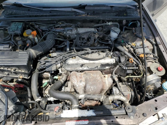 1992 Honda Accord z VIN 1HGCB7277NA019206, wystawiony jako Copart lot #54077035 z przebiegiem 227 766 mil mil oraz Szkoda całkowita • Salvage title. Historia ofert i sprzedaży dostępna na DreamBid. Obrazek 11.
