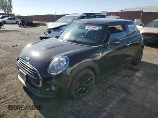 2018 MINI Hardtop Cooper with VIN WMWXP5C50J2G63153, listed as a Copart auction lot 58813195 with 52,875 mi miles and Salvage title. Bid and sale history available at DreamBid. Image 1.