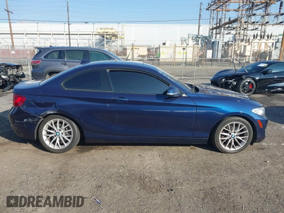 2015 BMW 2 Series 228i xDrive with VIN WBA1F7C5XFV367287, listed as a IAAI auction lot 40802463 with 113,427 mi miles and . Bid and sale history available at carsss.com. Image 13.