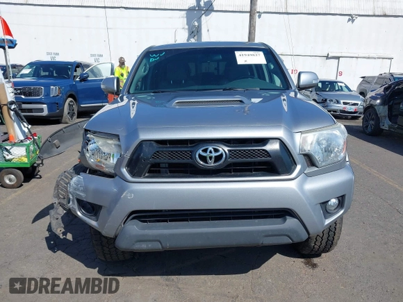2014 Toyota Tacoma with VIN 3TMLU4EN7EM146705, listed as a IAAI auction lot 41949827 with 147,887 mi miles and . Bid and sale history available at DreamBid. Image 12.