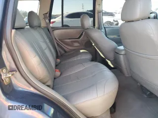 2004 Jeep Grand Cherokee Laredo z VIN 1J4GW48S74C159381, wystawiony jako Copart lot #53972115 z przebiegiem 128 309 mil mil oraz Szkoda całkowita • Salvage title. Historia ofert i sprzedaży dostępna na DreamBid. Obrazek 11.