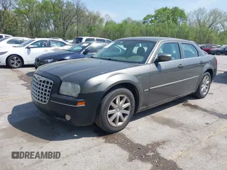 2008 Chrysler 300 Touring with VIN 2C3LA53G48H295678, listed as a IAAI auction lot 42007155 with 218,020 mi miles. Bid and sale history available at carsss.com. Image 2.