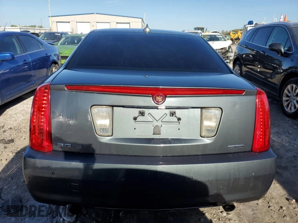 2009 Cadillac STS RWD z VIN 1G6DW67V390104597, wystawiony jako Copart lot #73794724 z przebiegiem Nie podano mil oraz Szkoda całkowita • Salvage title. Historia ofert i sprzedaży dostępna na DreamBid. Obrazek 6.