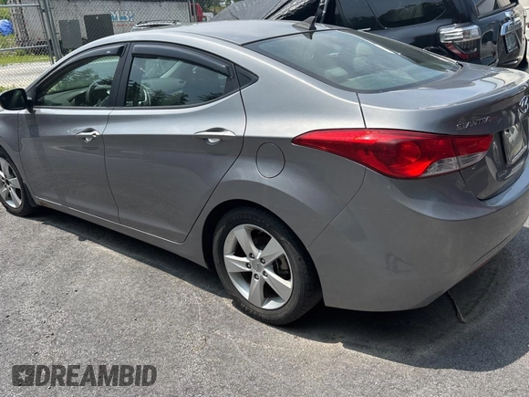 2012 Hyundai Elantra Limited z VIN KMHDH4AE6CU422133, wystawiony jako Copart lot #61023095 z przebiegiem 141 500 mil mil oraz Czysty tytuł • Clean title. Historia ofert i sprzedaży dostępna na DreamBid. Obrazek 3.