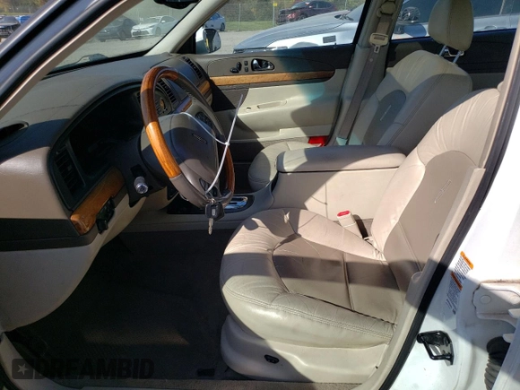 2002 Lincoln Continental with VIN 1LNHM97V62Y643532, listed as a Copart auction lot 76015984 with 154,374 mi miles and Salvage Title. Bid and sale history available at carsss.com. Image 7.