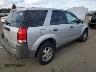 2004 Saturn VUE with VIN 5GZCZ23D74S856160, listed as a Copart auction lot 87660695 with 114,116 mi miles and Salvage Title. Bid and sale history available at DreamBid. Image 3.