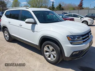 2018 Volkswagen Atlas SE z VIN 1V2KR2CAXJC586848, wystawiony jako IAAI lot #42200959 z przebiegiem 96 336 mil mil oraz . Historia ofert i sprzedaży dostępna na DreamBid. Obrazek 1.