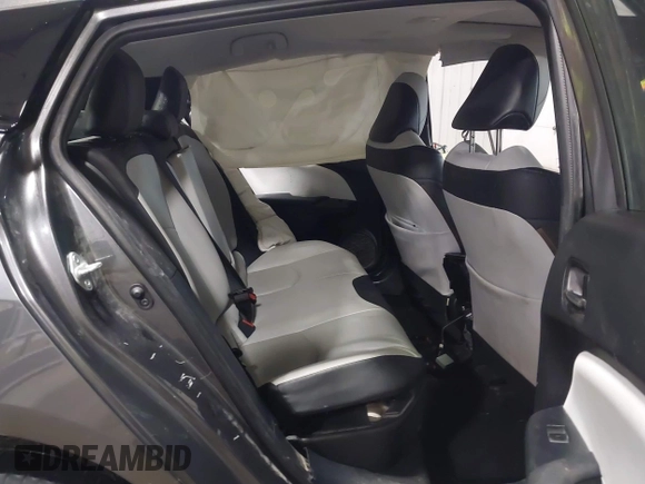 2021 Toyota Prius L Eco z VIN JTDKAMFU9M3132587, wystawiony jako IAAI lot #41637275 z przebiegiem 84 203 mil mil oraz . Historia ofert i sprzedaży dostępna na DreamBid. Obrazek 8.