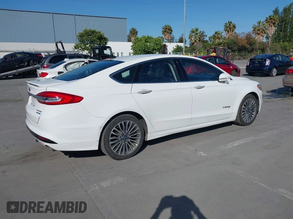 2017 Ford Fusion Hybrid Titanium с VIN 3FA6P0RU3HR323164, выставлен на аукционе IAAI как лот 42303571 с пробегом 119 732 миль миль и . История ставок и продаж доступна на DreamBid. Изображение 4.